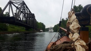 Sailing past the rail swing bridge with our fellow waterway transients